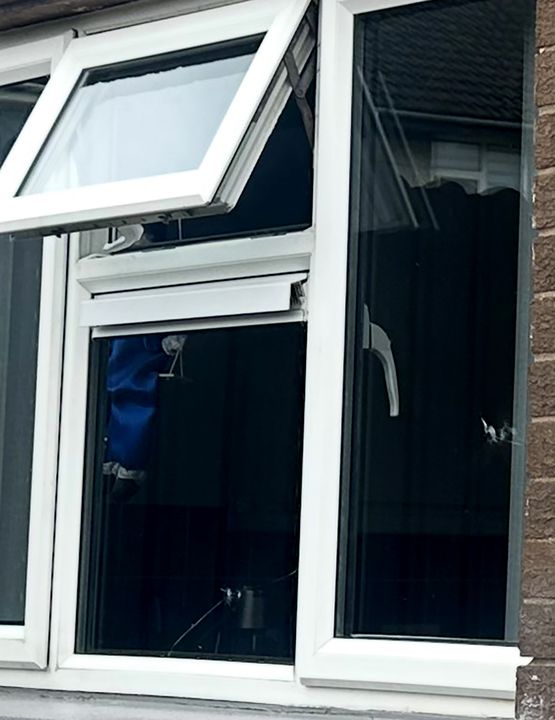 The smashed windows in his flat in the loyalist estate of Ballymacash in Lisburn